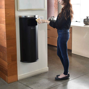 9 Gallon Black Powder-Coated Steel Half-Round Side-Entry Trash Can in office kitchen