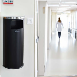 9 Gallon Black Powder-Coated Steel Half-Round Side-Entry Trash Can in hospital hallway